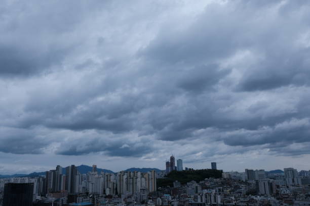 istock Dark Seoul city view with black clouds before raining 1157030871