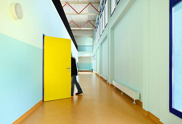 public school, long corridor with yellow door \u2028http://i705.photobucket.com/albums/ww51/piovesempre/banner_architecture2.jpg