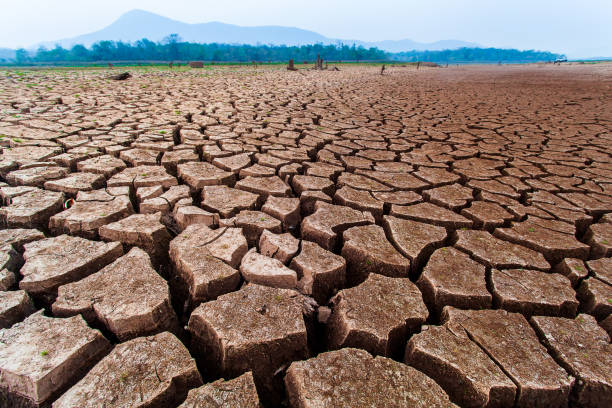 istock Cracked dry land without water.Abstract background 1157035868