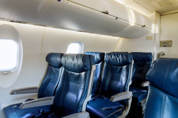 istock Armchairs in a built-in chairs Aircraft Cabin Economy class 1157037745