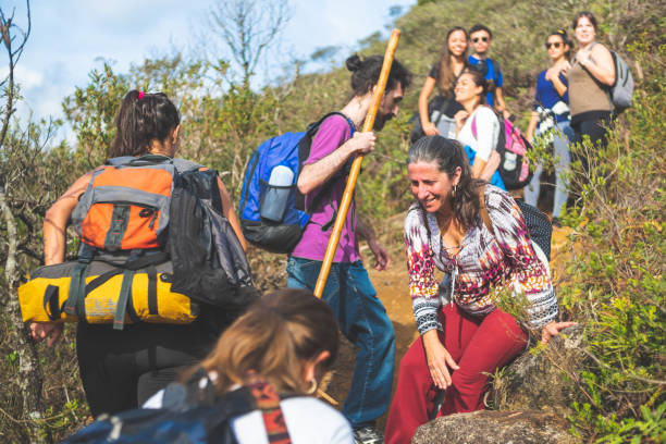 istock Group of people exploring the mountains 1157050223