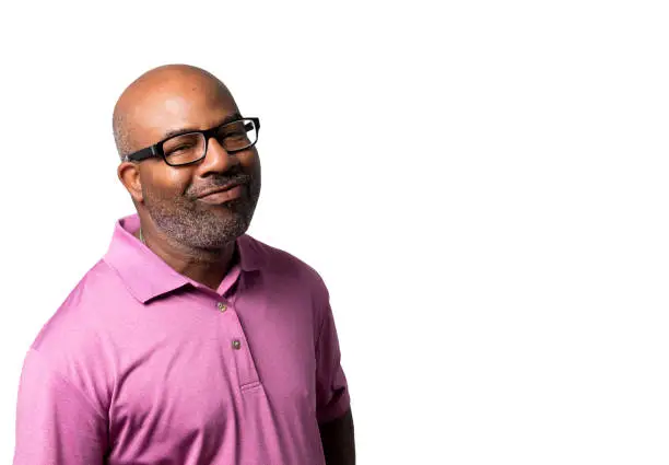 Portrait of a Cheerful smiling African American with purple shirt and black glasses on  white isolated background
