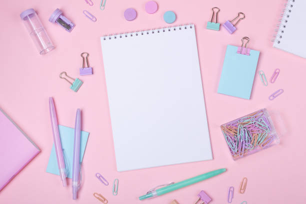 istock School background with notebooks and pastel colorful study accessories on pink background Back to school concept 1157058496