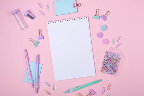 istock School background with notebooks and pastel colorful study accessories on pink background Back to school concept 1157058718