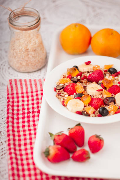 istock Healthy oats breakfast with various fruit toppings and soy milk. 1157062719