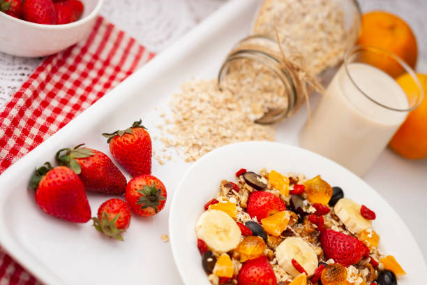 istock Healthy oats breakfast with various fruit toppings and soy milk. 1157062889