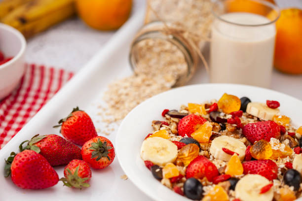 istock Healthy oats breakfast with various fruit toppings and soy milk. 1157062894