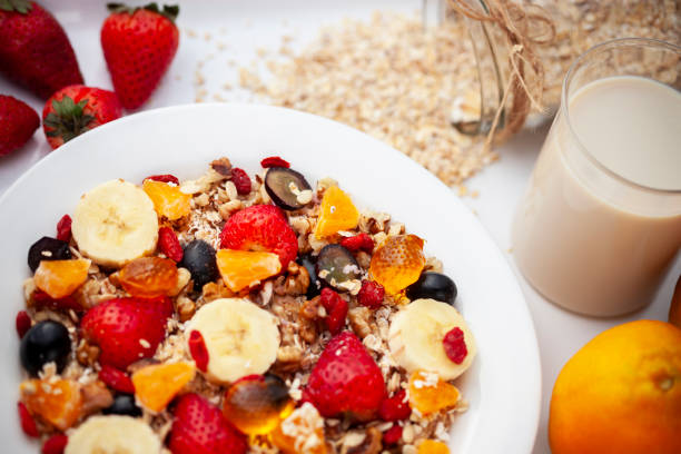 istock Healthy oats breakfast with various fruit toppings and soy milk. 1157063114