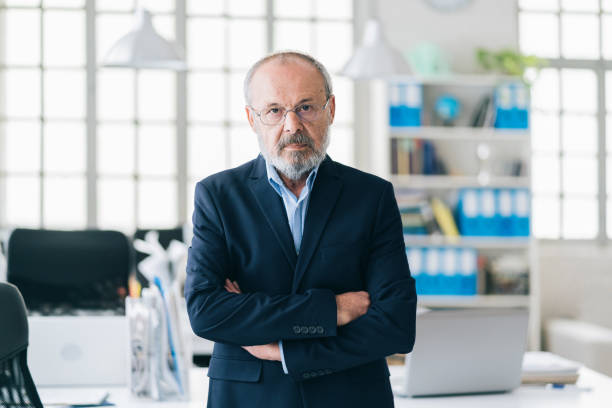 istock Confident senior businessman leader at office 1157067224