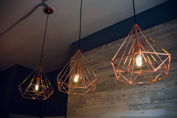 istock retro incandescent lamp in a modern loft style, wall lamp modern. horizontally. 1157069743