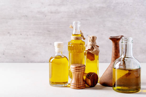 istock Olive oil in glass bottles 1157071344