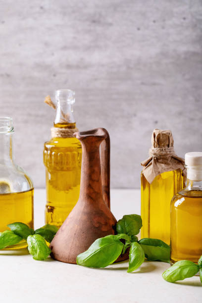 istock Olive oil in glass bottles 1157074865