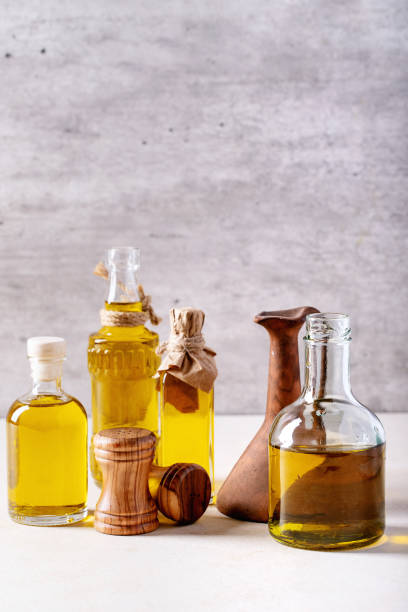 istock Olive oil in glass bottles 1157074875