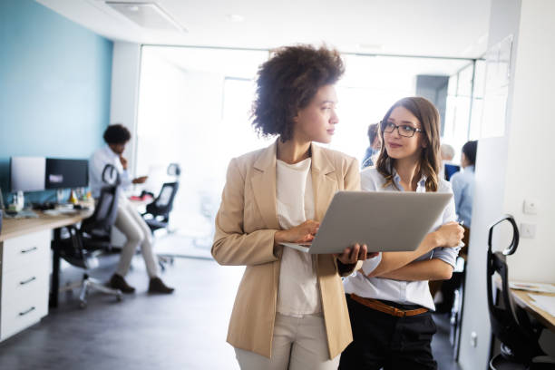 istock Successful business group of people at work in office 1157075319