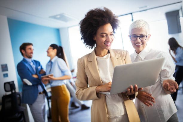istock Successful business group of people at work in office 1157075327
