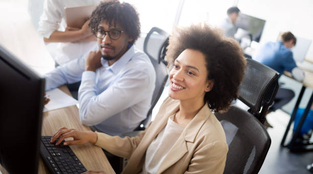 istock Successful business group of people at work in office 1157075377