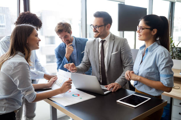 istock Successful business group of people at work in office 1157075457