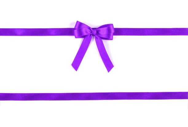 istock Shiny purple silk ribbon on white background. 1157075586