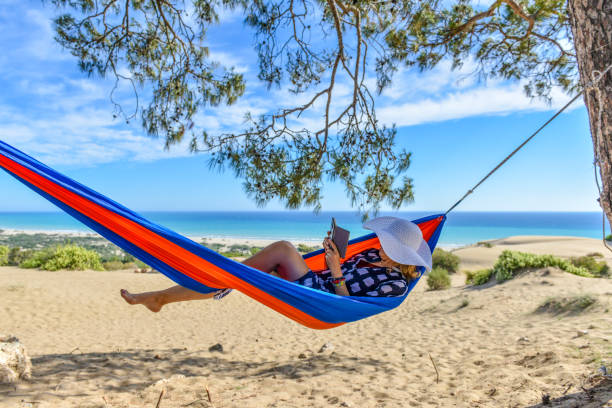 istock Happy woman in hammock. 1157081408