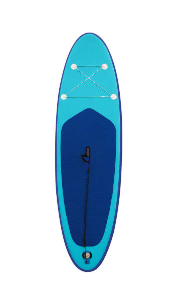 blaues stand-up-paddleboard isoliert - paddelbrett stock-fotos und bilder