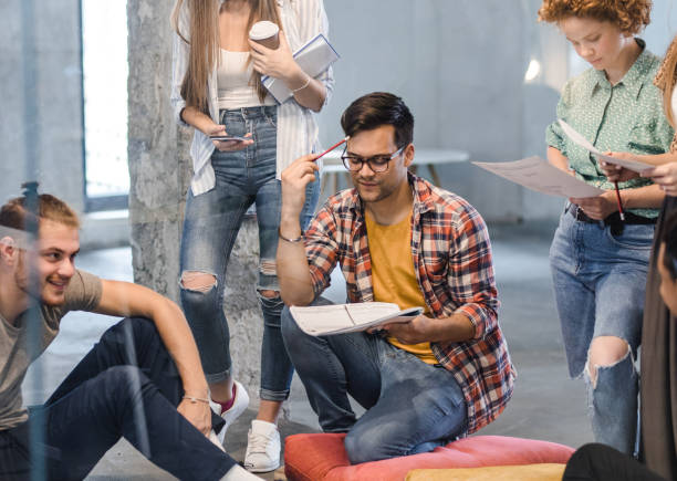 istock Group of students learning for their upcoming exams at campus. 1157082793