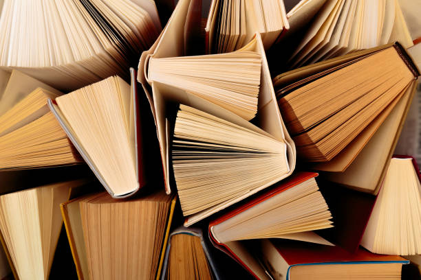 istock Old and used hardback books  top view - Image 1157082863