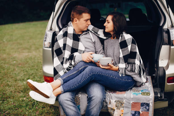 istock Beautiful couple spend time in a summer park 1157084073