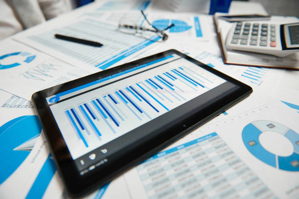 istock Office workspace for business. Tablet pc and reports. Table closeup. Business financial accounting concept. 1157086650