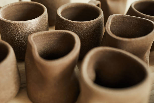 istock Handmade Mugs in Pottery Shop 1157087988