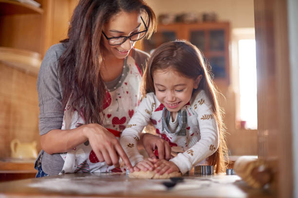 istock Mom has a little helper in the kitchen today 1157091680