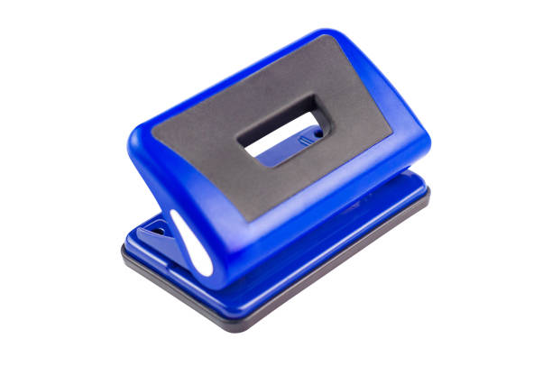 istock One blue metallic hole puncher isolated on white background. Clipping path - image 1157098816
