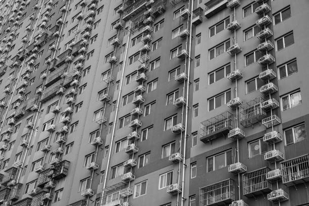 istock Crowded apartment building in Beijing, China, dense windows 1157098832