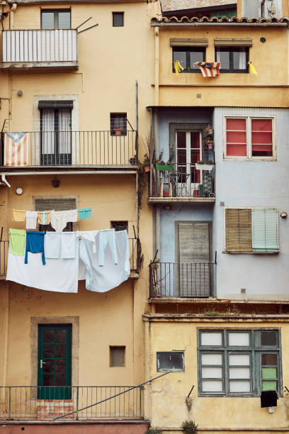 istock Wet clothes and flags on balconies 1157102392