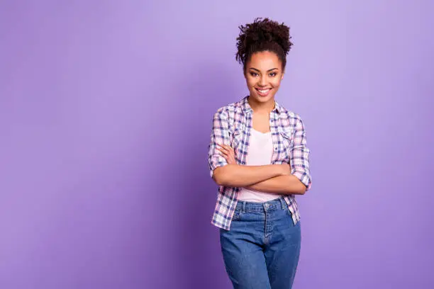 Photo of Portrait of her she nice-looking charming cute lovable pretty winsome attractive lovely cheerful cheery wavy-haired girl in checked shirt isolated over violet purple pastel background