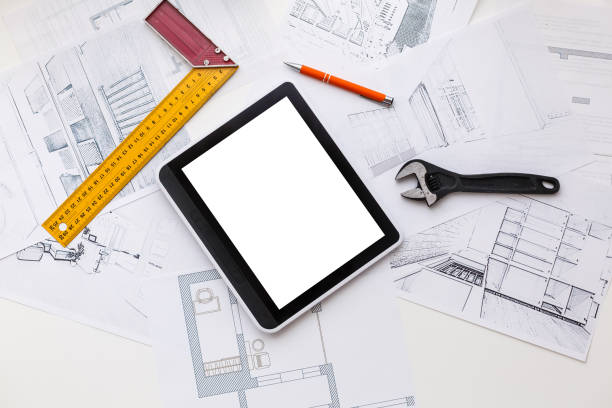 istock Computer Tablet with Master Bathroom Design Over House Plans, Pencil and Compass 1157106776