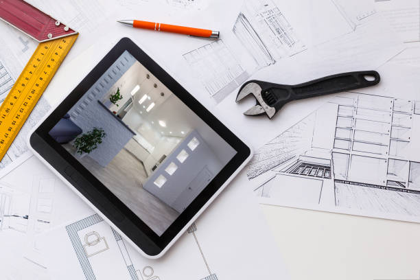 istock Computer Tablet with Master Bathroom Design Over House Plans, Pencil and Compass 1157106808