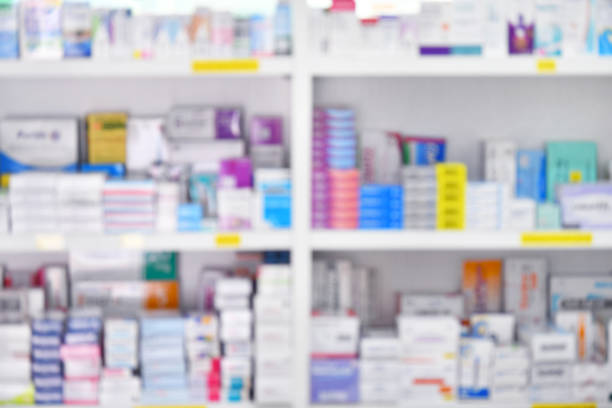 istock Medicine on shelves in Pharmacy interior with blurred 1157108306