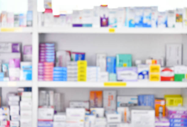 istock Medicine on shelves in Pharmacy interior with blurred 1157108891