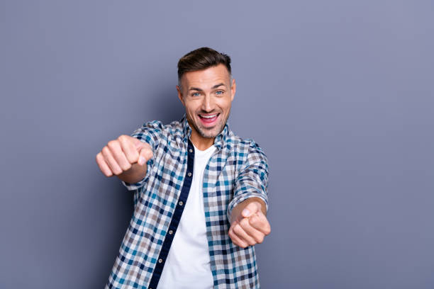 Portrait of nice attractive confident cheerful cheery glad bearded guy wearing checked shirt holding in hands driving invisible car isolated over blue pastel background Portrait of nice attractive confident cheerful cheery glad bearded guy wearing, checked shirt holding in hands driving invisible car isolated over blue pastel background driving steering wheel stock pictures, royalty-free photos & images