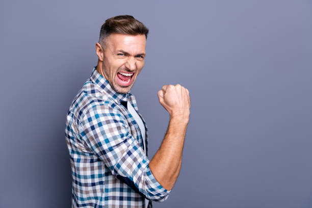 istock Profile side half-turned portrait of his he nice attractive cheerful cheery glad optimistic satisfied bearded guy wearing checked shirt satisfactory isolated over blue pastel background 1157117481
