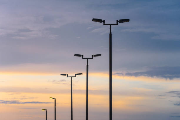 istock Electric street light at sunset 1157119968