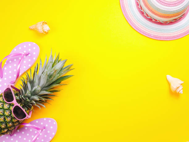 istock Pineapple wearing sunglasses on a yellow background 1157121789