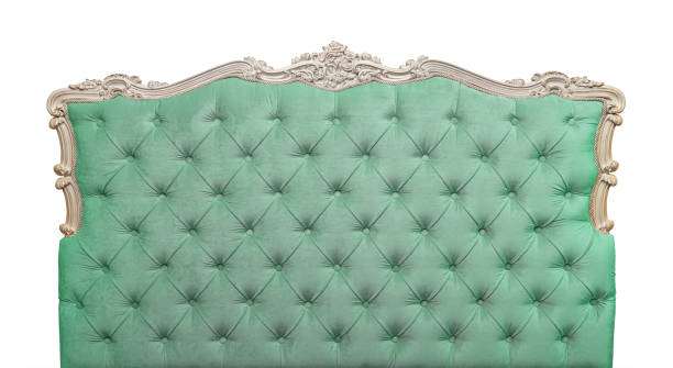 Green velvet bed headboard isolated on white