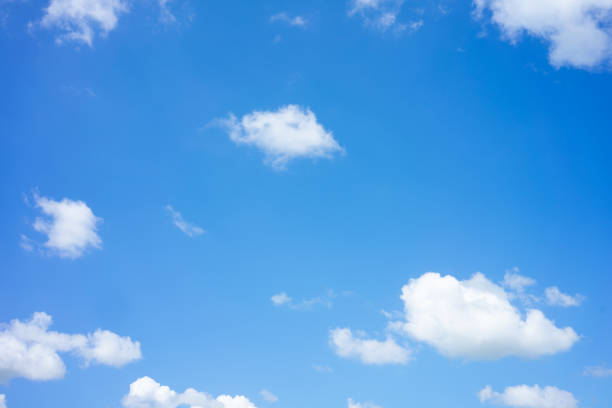 istock The sky is bright blue. There are clouds floating through. Feel relax when looking. See the sun on the sun. 1157125941