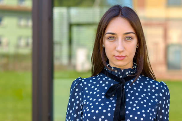 istock Serious demure stylish young woman 1157129311