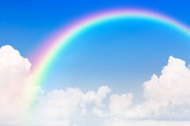 cielo azul y nube blanca y arco iris. - white mid air rain wind fotografías e imágenes de stock