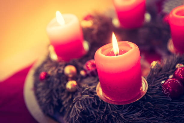istock Traditional Christmas decoration: Advent wreath with red lights 1157131029