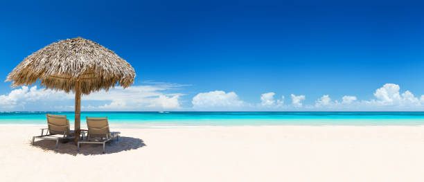 beach chairs with umbrella and beautiful sand beach. - lagoon tranquil scene sea water imagens e fotografias de stock