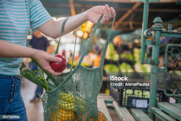 Fruits And Vegetables In A Cotton Mesh Reusable Bag Zero Waste Shopping On Outdoors Market Stock Photo - Download Image Now
