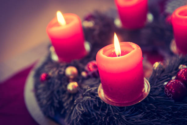 istock Traditional Christmas decoration: Advent wreath with red lights 1157133078